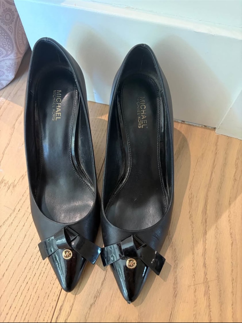 MICHAEL Michael Kors Black Pointed Toe Bow Pumps with Gold MK Accent